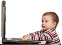 Baby on computer photo